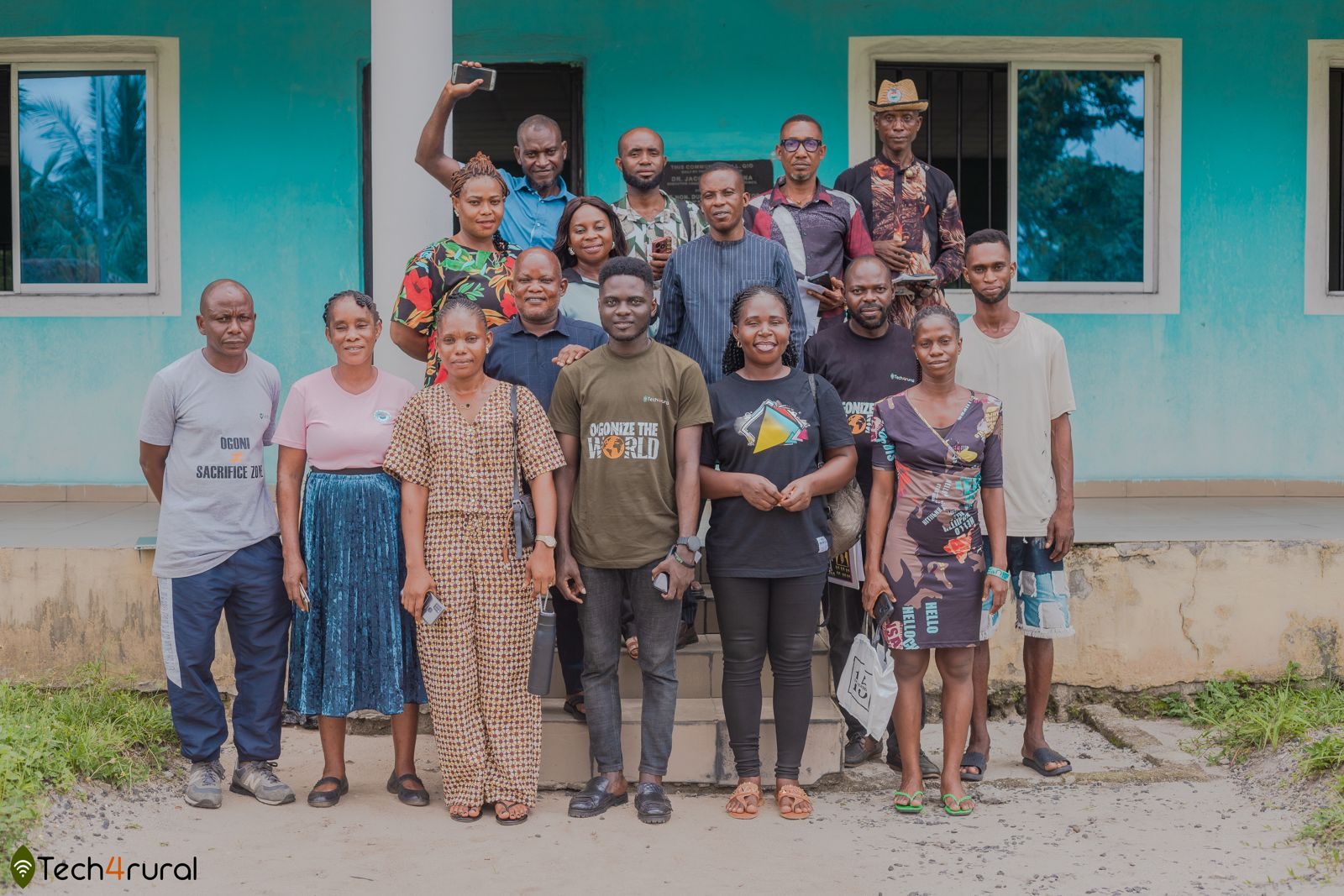 Community members and Tech4Rural team outside a community hall