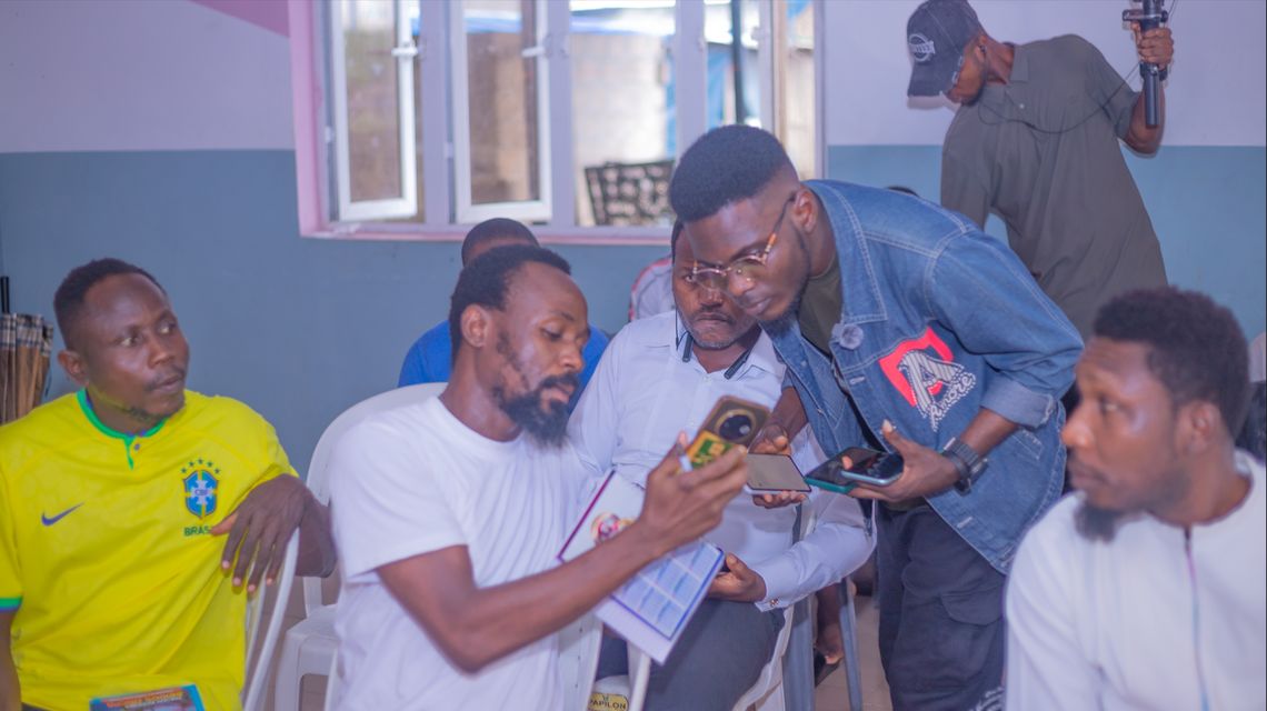 Workshop participants learning CoMapeo on their phones