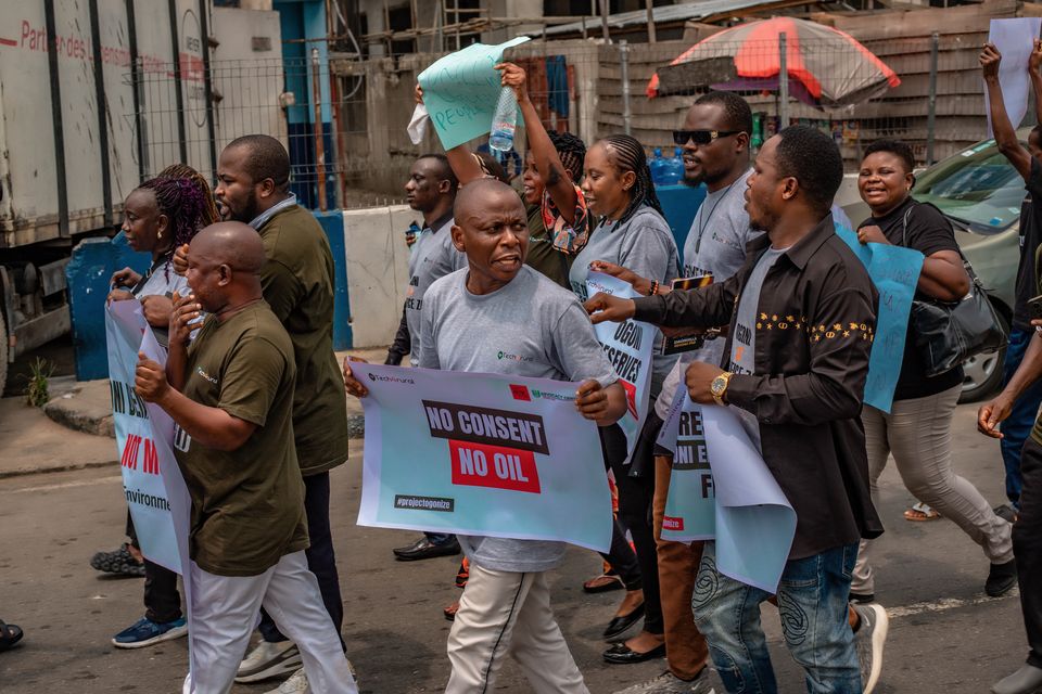 Project Ogonize march with No Consent, No Oil placards