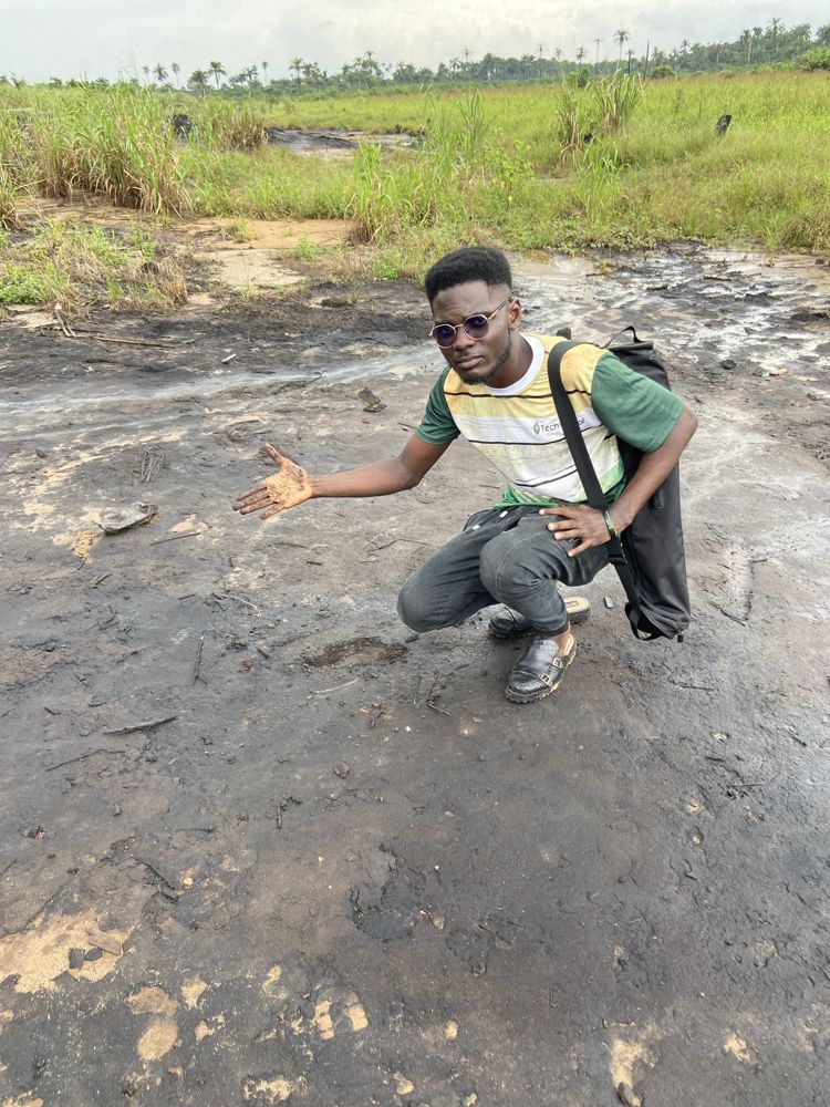 Oil-soaked ground at a spill site